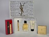 an image of a box containing a bottle of perfume and a bottle of perfume