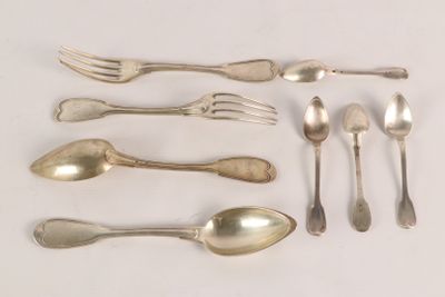 a lot of silver spoons and forks on the table