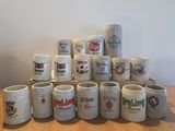 many different types of coffee mugs sitting on a table