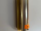 a wall mounted soap dispenser on the wall