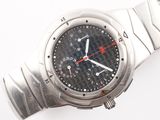 a close up of a wrist watch on a white surface