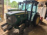 a tractor that is parked inside of a building