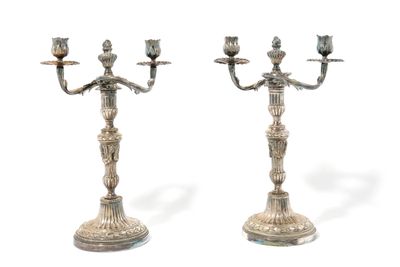 pair of antique silver plated candlesticks on pedestals