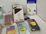 many different cell phones that are sitting on a table