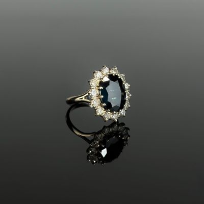 a sapphire and diamond cluster ring