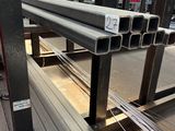 a large amount of steel pipes in a warehouse