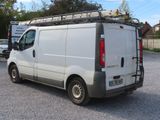 a white van that is parked in a parking lot