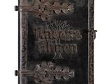 un vieux livre avec un arbre sur la couverture