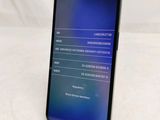 the back of a black samsung s9 with a display on the screen
