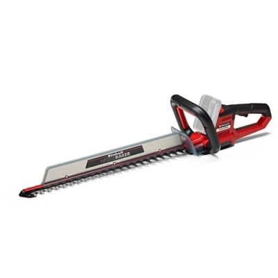 un gros plan d'une taille-haie électrique rouge et noire sur fond blanc