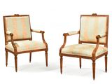 pair of louis xvi style walnut armchairs with upholstered upholstered arms