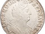 Pièce en argent avec la tête d'une femme de profil
