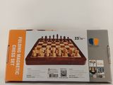 chess set in a box on a table with a white background