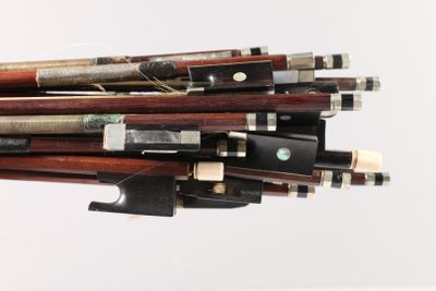 a lot of different types of musical instruments on a white surface