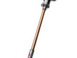 a close up of a cordless vacuum cleaner on a white background