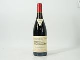 a bottle of wine that is sitting on a table