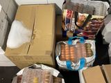 many boxes of food sitting on the floor next to each other
