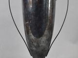 a silver trophy that is sitting on a table