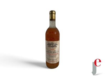 an image of a bottle of wine sitting on top of a white surface
