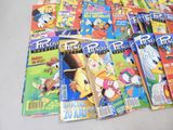a lot of comics on the table together