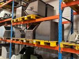 many different types of appliances on the shelves in the warehouse