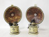 pair of antique brass and marble lamps on stands with black and white designs
