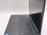 a laptop that is sitting on a white table