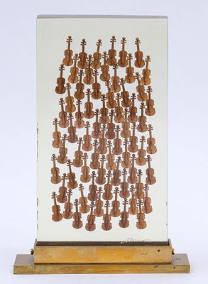 a close up of a display of musical instruments on a wooden stand