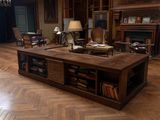 a living room with a large wooden table and a fireplace