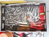 a box full of tools that are sitting on a table