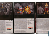 three boxes of action figures on display in a store