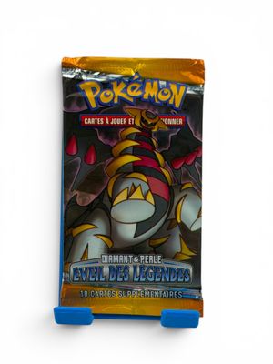 a close up of a bag of pokemon cards on a white surface