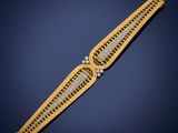 a gold and diamond bracelet, by cartier
