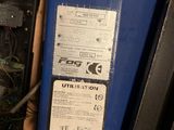 a cell phone that is sitting on top of a blue box