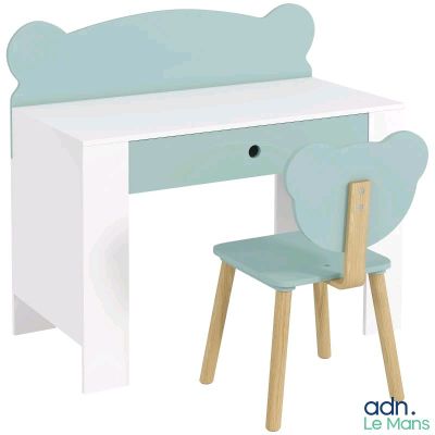 a desk with a chair and a desk top with a teddy bear on it