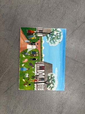 une photo d'un tableau représentant une maison posée à même le sol