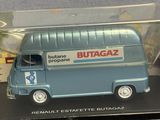 a blue bus that is in a clear box