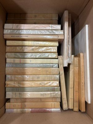 a box full of books sitting on the floor