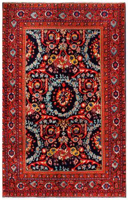 un tapis rouge et bleu à motifs de médaillons