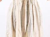 an image of a woman ' s dress on a mannequin stand