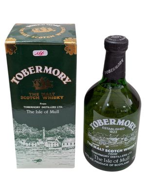 an image of a bottle of whisky next to a box