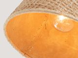 a close up of a lamp with a burlock shade on it