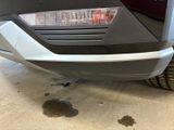 a close up of the front bumper of a car