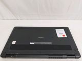an open laptop computer sitting on top of a white surface