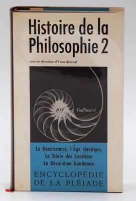 a close up of a book on a table with a white background