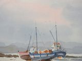 two boats that are sitting in the water