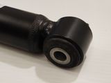 a close up of a small black object on a table