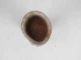 a cup of coffee sitting on a white table