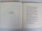 an open book with a picture of a cat on it