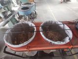 two bowls of food sitting on a table in a room